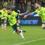 Gol Menit-Menit Akhir: Behich Bawa Australia Menang 1-0 atas Jepang" bisa diubah menjadi:

"Behich Cetak Gol Penentu di Menit Terakhir: Australia Kalahkan Jepang 1-0